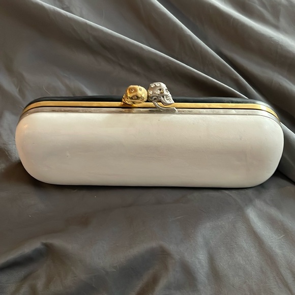 Alexander McQueen Handbags - Alexander McQueen double skull clutch.Needs help. would make a good project.